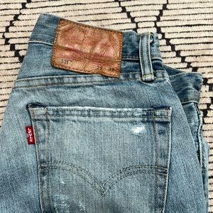 Vintage distressed Levi’s 511 jeans